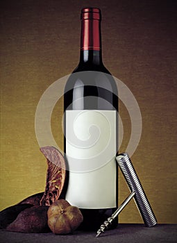 Bottle of red wine still life with warm background