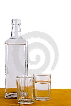 Bottle of Russian vodka and glasses