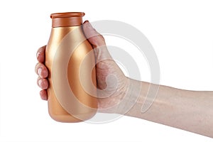 Bottle with shampoo in hand