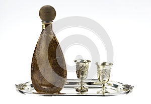 Bottle and silver goblets