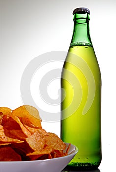Bottle of soda and snacks