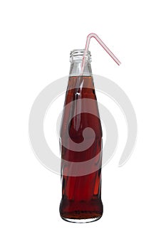 Bottle of soda with straw