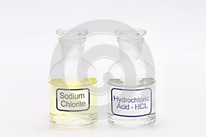 Bottle of sodium chlorite next to activator Hydrochloric acid HCL, purifying chemicals and powerful disinfectants