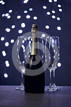 Bottle of sparkling wine and glasses