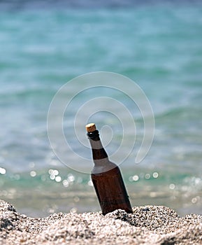 bottle stranded on the beach that may contain a secret message t