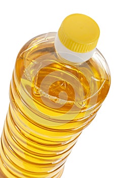 Bottle of sunflower oil closeup isolated