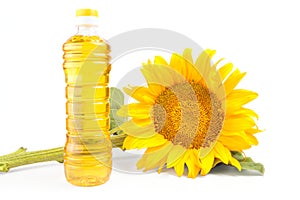 Bottle of sunflower oil with flower isolated on white background