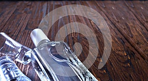 Bottle vodka tequila gin on wooden table with copy space. View from above. Selective focus, close up
