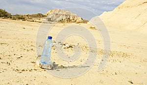 Bottle of water in Desert of the Bardenas Reales