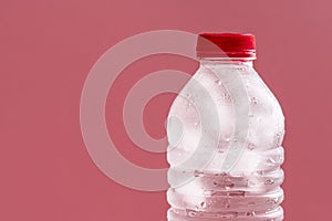 Bottle of water with ice cubes. Water in a plastic bottle