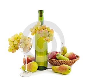 Bottle of white wine and various fruits