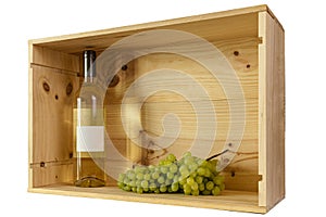 A bottle of white wine and white grapes in a wooden box with copy space