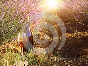 Bottle of wine against lavender landscape
