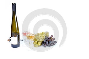 Bottle of wine with aperitive, glasses of wine photo