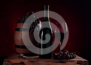Bottle of wine and barrel