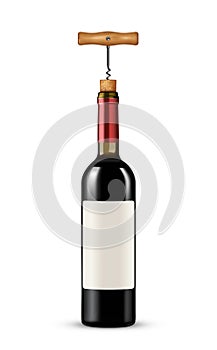 Bottle of wine with corkscrew on white background
