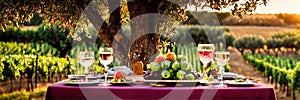 bottle of wine with fruit and food on the background of a vineyard. Selective focus.