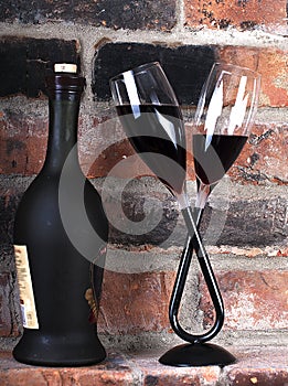 A bottle of wine and two glasses