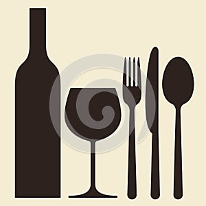 Bottle, wineglass and cutlery