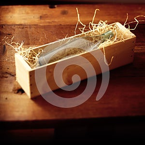 Bottle in wooden box