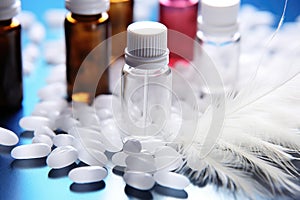 bottled homeopathic dilutions next to a white feather photo