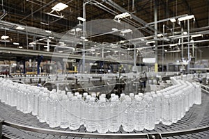 Bottled water on conveyor at bottling plant