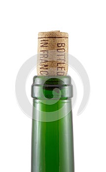 Bottleneck and cork on a white