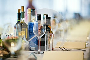 Bottles of alcohol on a party table photo