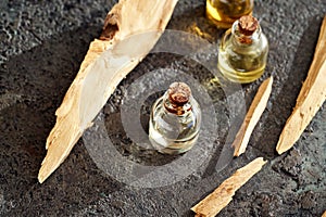 Bottles of aromatherapy essential oil with white sandalwood