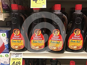 Bottles of Aunt Jemima Butter Rich pancake syrup on grocery shelf