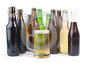 Bottles of beer and beer mug.