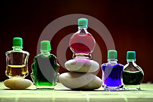 Bottles with colored aroma oils