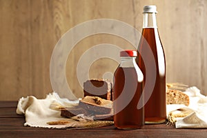 Bottles of delicious fresh kvass, spikelets and bread