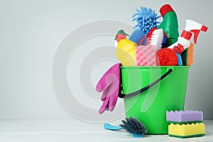 Bottles with detergent and cleaning tools