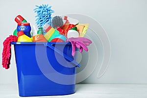 Bottles with detergent and cleaning tools