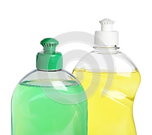 Bottles with different detergents on background