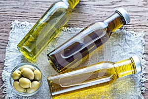 Bottles with different kinds of olive oil