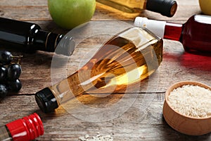 Bottles with different kinds of vinegar and ingredients