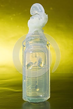 Bottles with a drug, eye medicines, treatment of ophthalmic diseases, transparent colorless medicine for instillation