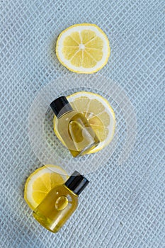 Bottles with essential lemon oil. Healthy natural beauty treatment