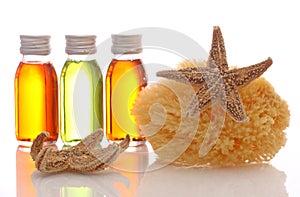 Bottles with essential oils and sponge