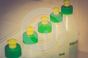 Bottles with glue/bottles with glue stand in a row, selective focus