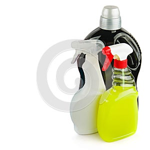 Bottles with household chemicals isolated on white. Free space for text