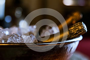 Bottles of luxury champagne in frape with ice. photo