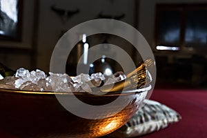 Bottles of luxury champagne in frape with ice. photo