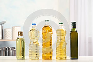 Bottles of oils on table