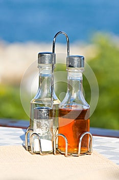Bottles with olive oil, vinegar, salt