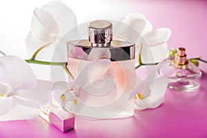 Bottles of perfume with orchid