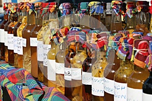 Bottles of rum on sale in a street market in Guadeloupe