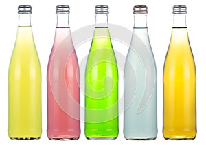 Bottles with soda drinks from agave, guava, pear, lime and tarragon